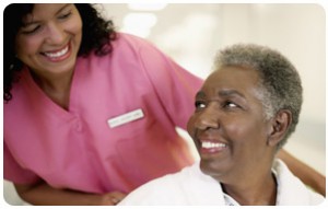 Nurse smiling at patient