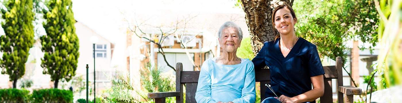 MJHS_about_header_1400x360 Elderly Patient and Female Nurse Smile at the Camera Outdoors