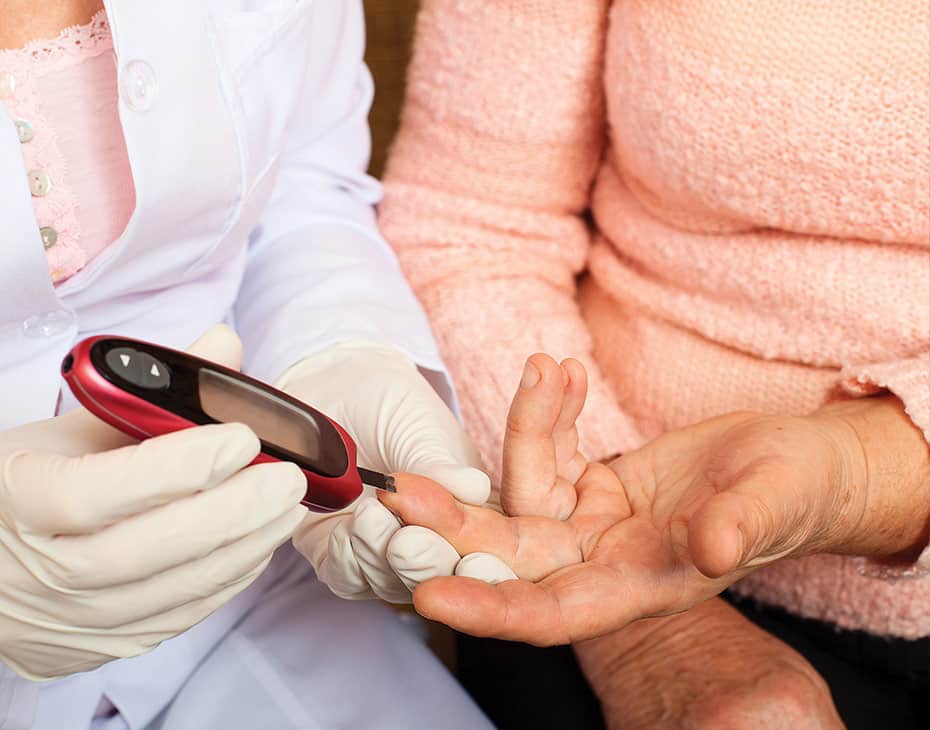 home_care_disease_specific_930x730 Nurse Checking Blood Sugar of Elderly Woman in Home