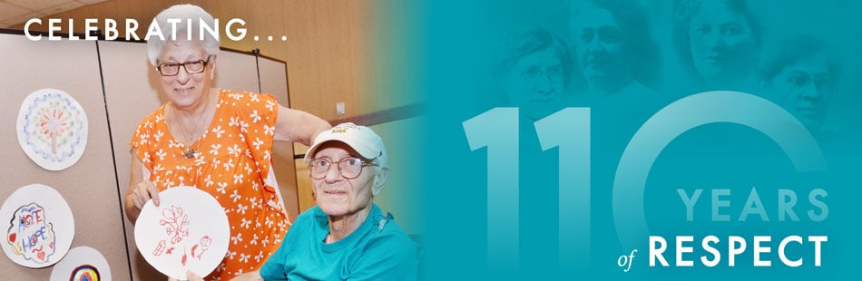 2017-_Banner_BK-Ladies_110_Respect_950x310_2.jpg Elderly Couple Holds Up a Drawing