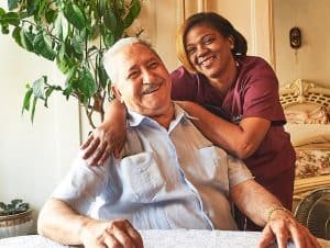 Smiling Male Patient with MJHS Nurse