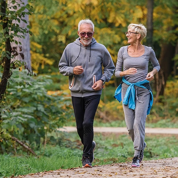 Elderly couple out for a jog